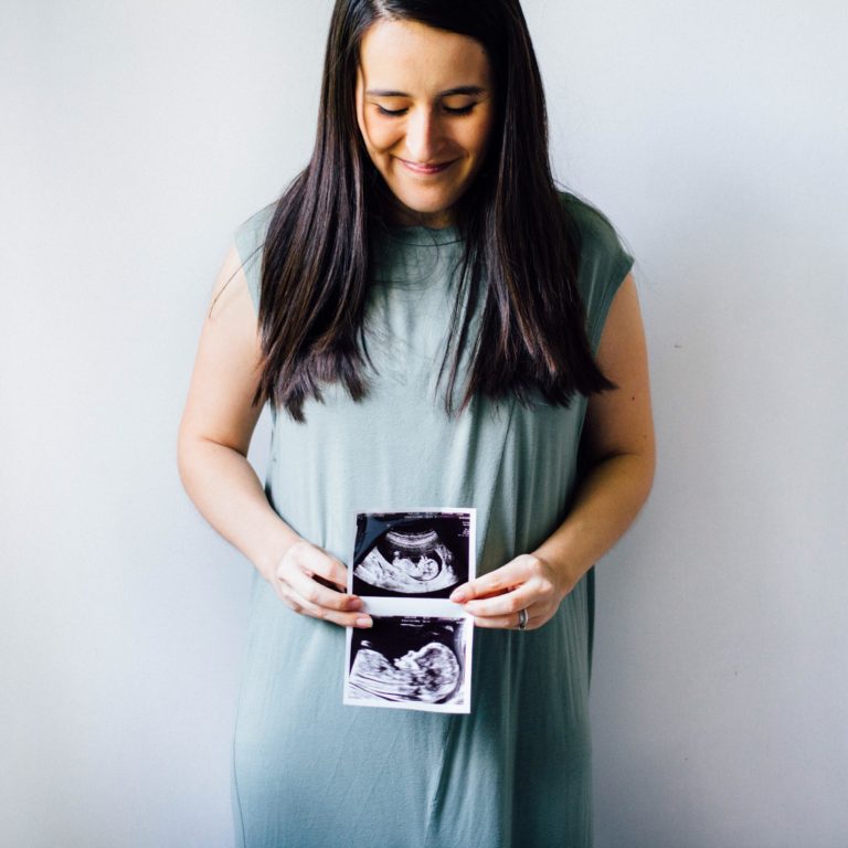 Pregnancy announcement with ultrasound pictures