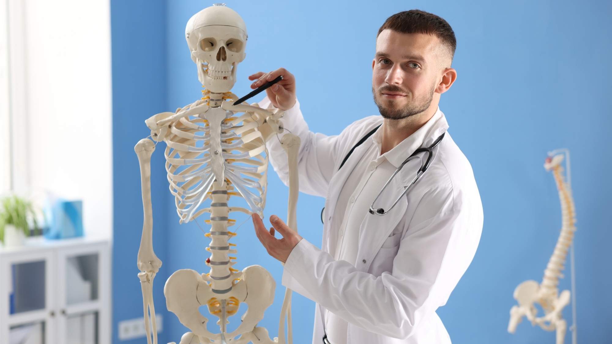 OHIP bone density test coverage for axial DXA of the hip and spine